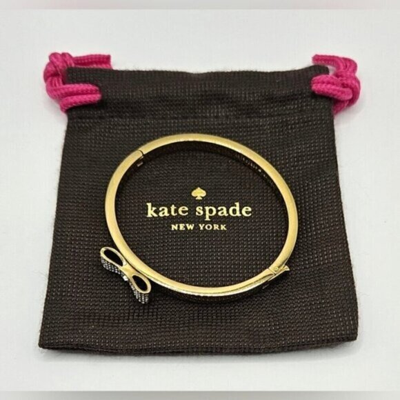 Kate Spade New York Gold-Tone Bow Bangle Bracelet with Crystals + Pouch - Picture 3 of 10